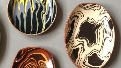 Turn simple clay surfaces into beautifully patterned works of art using slips and inlay.