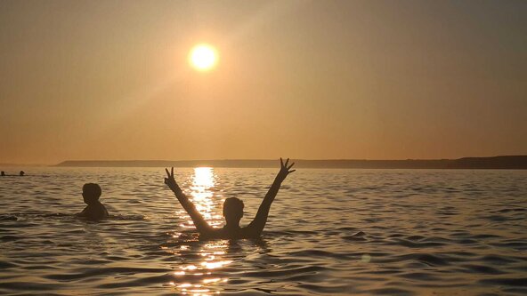 Sunset Solstice Serenity: Yoga, Sunset swim and Twilight picnic